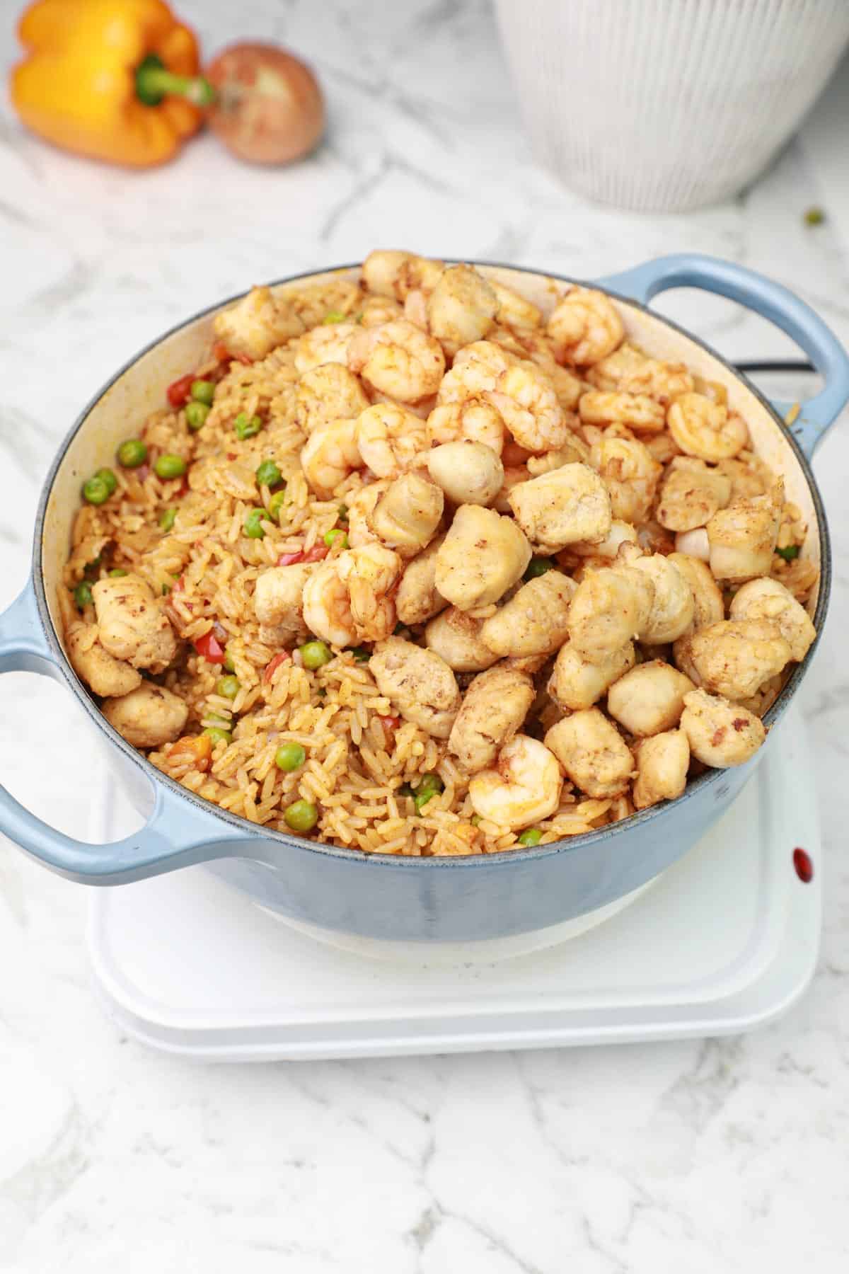 shrimp and sausage added to the pot.