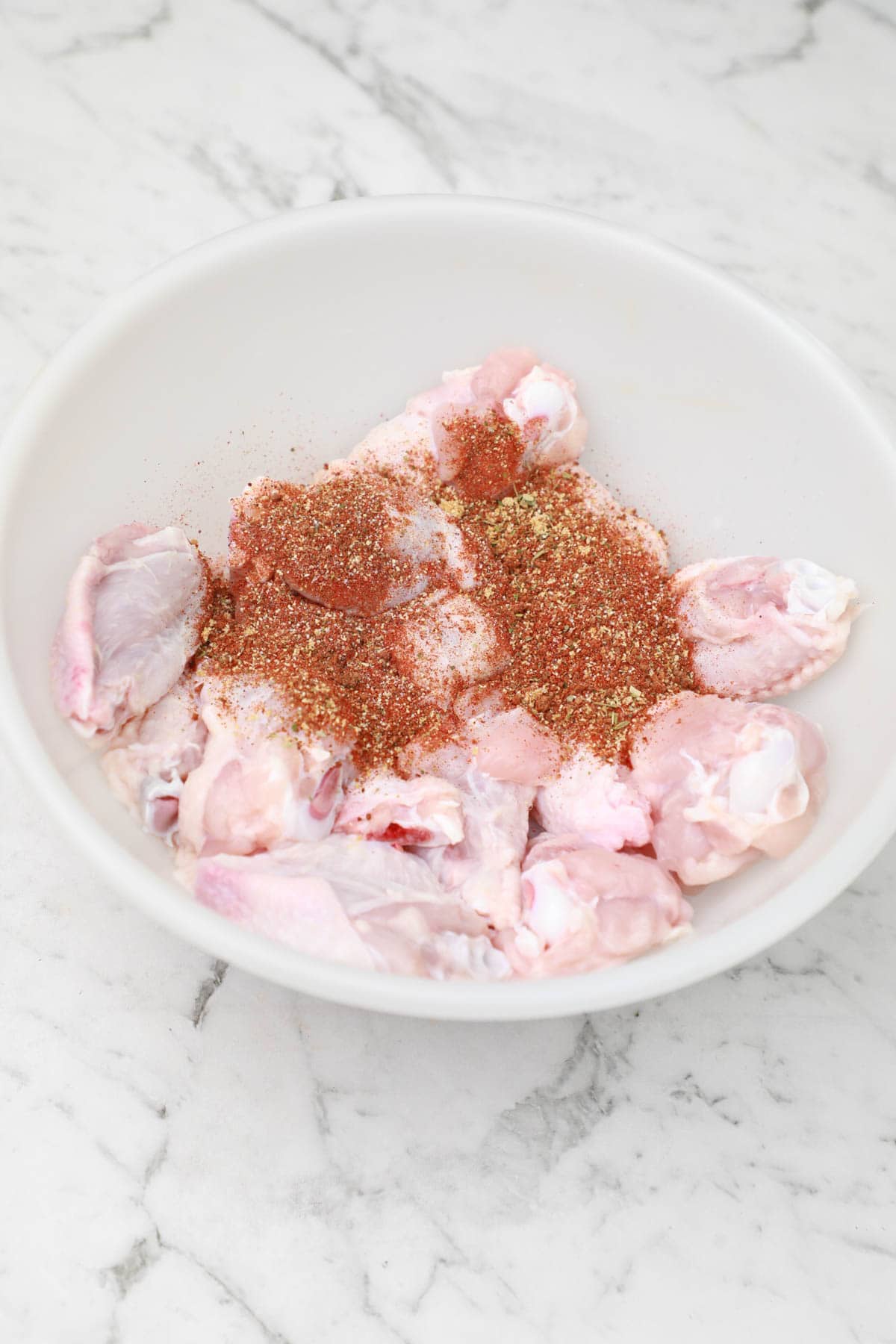 seasoning added to the wings.