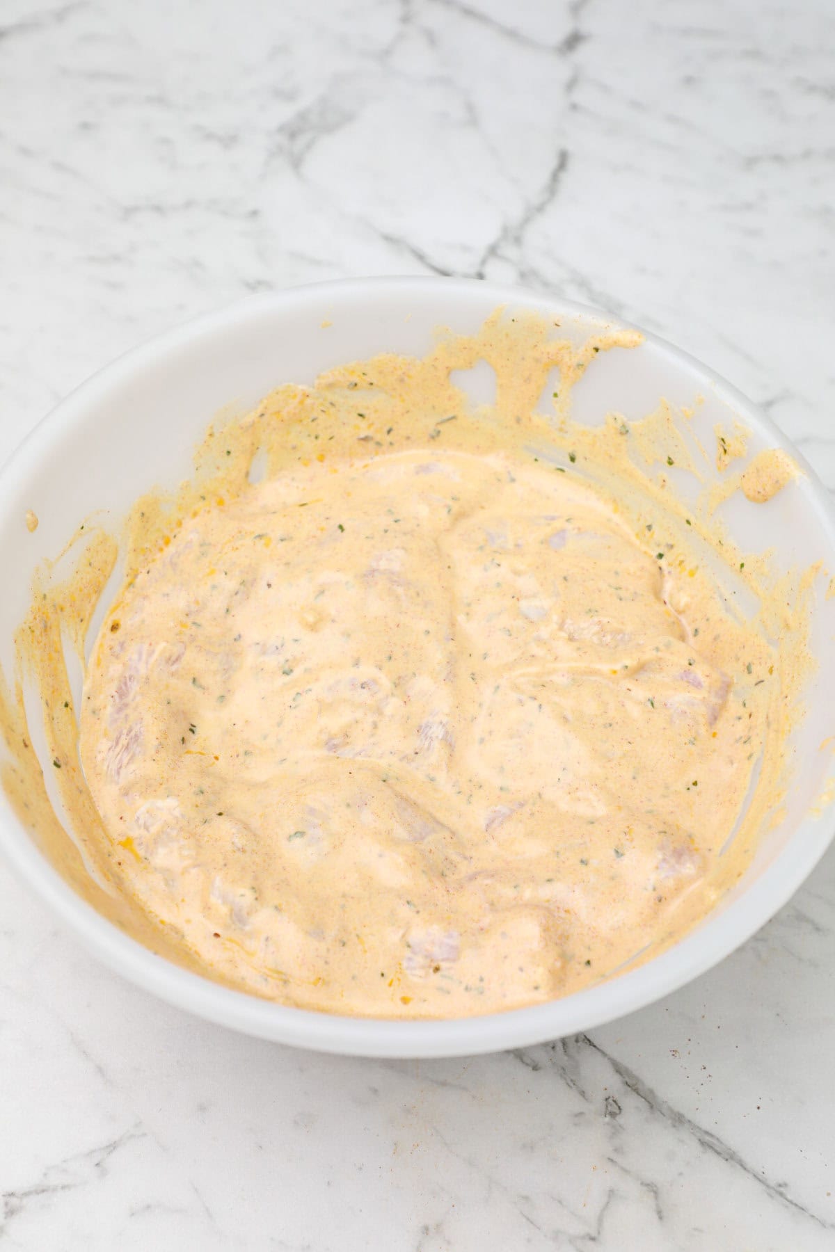 marinated in a bowl.